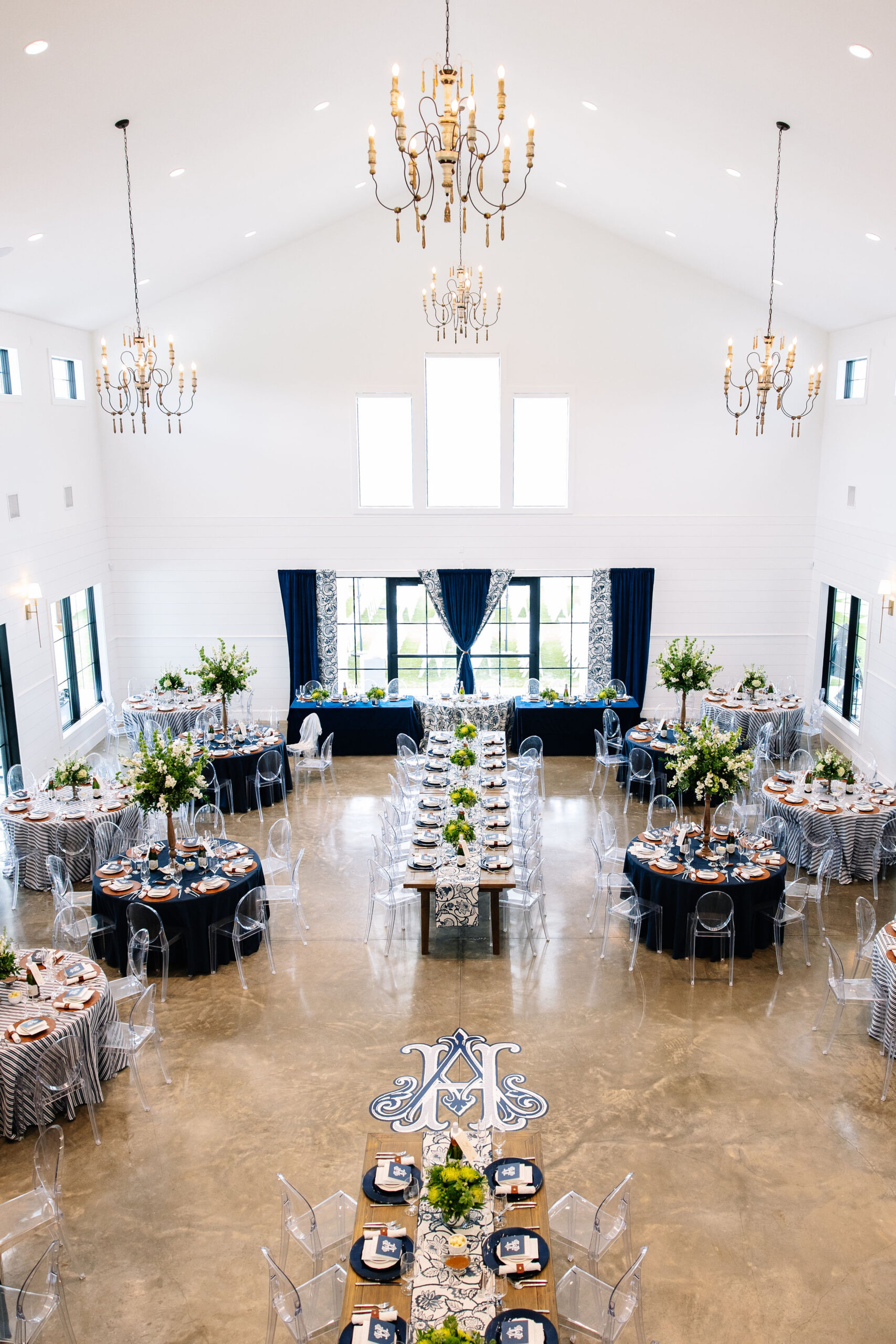 Bluestem Manor Manor Hall set up as a navy blue wedding reception.