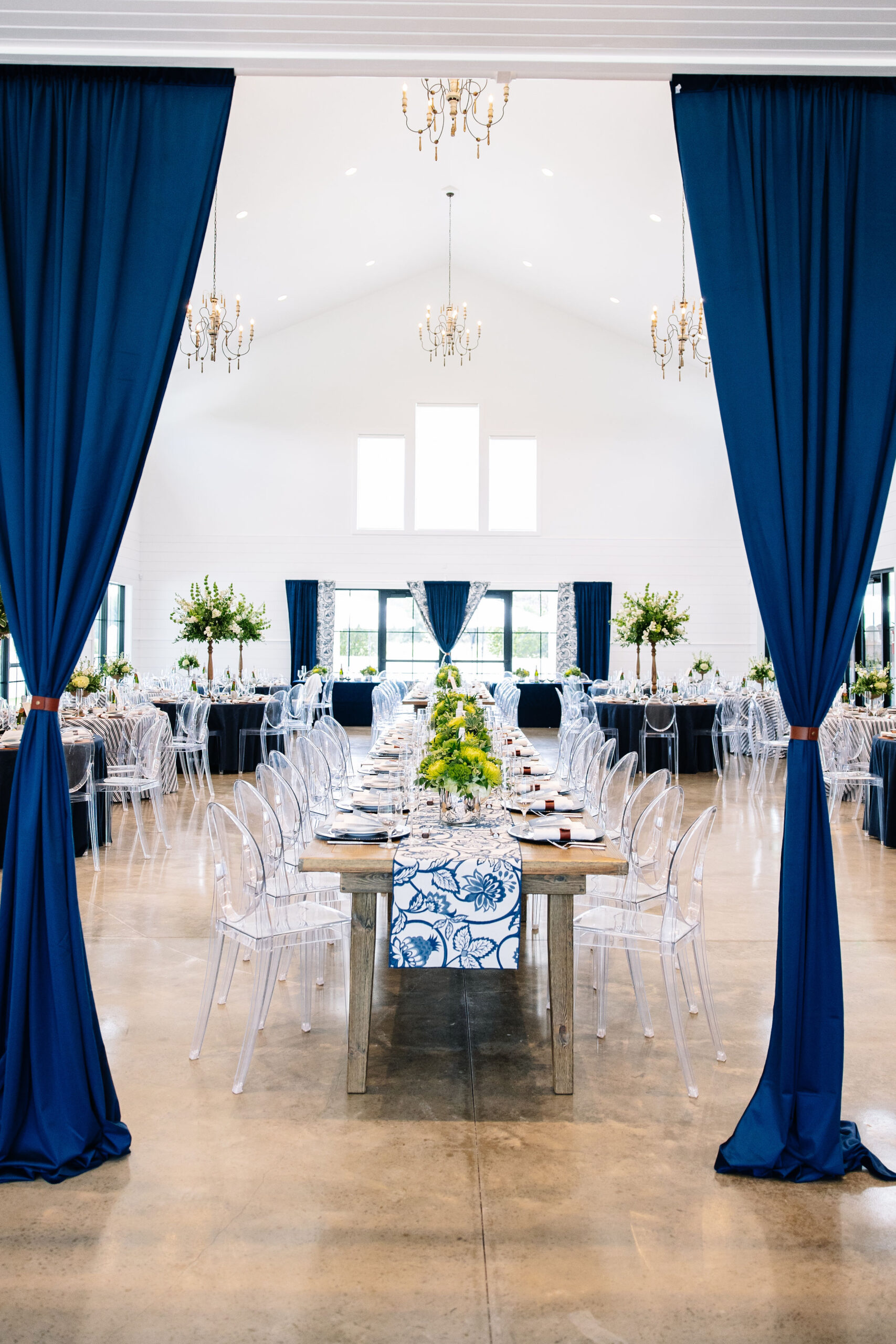 Bluestem Manor Manor Hall set up as a navy blue wedding reception.